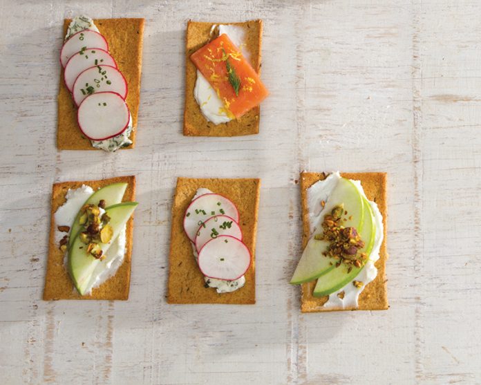 Rye Crisps topped with different toppings on white