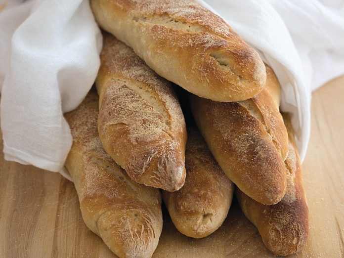 Sourdough Baguettes together on cutting board baking recipe