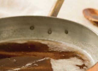 How to Make Browned Butter How to Make Browned Butter in coppper pot on cream surface