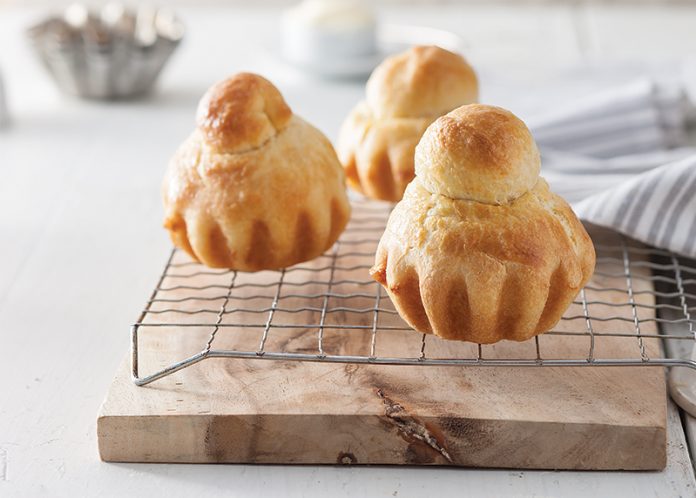 Mini Brioche à Tête on wire rack baking recipe