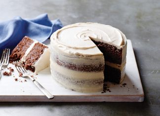 Baking with Beer Cocoa-Stout Cake with Malted Buttercream on white marble sliced