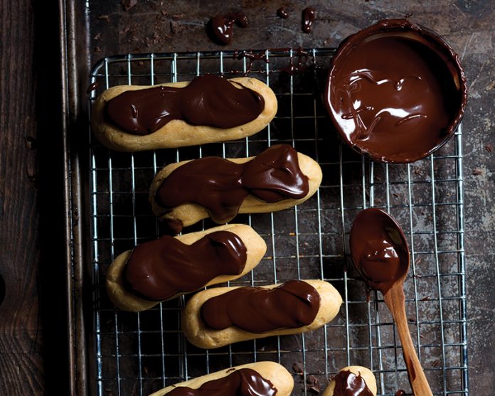 Chocolate Éclairs on wire rack