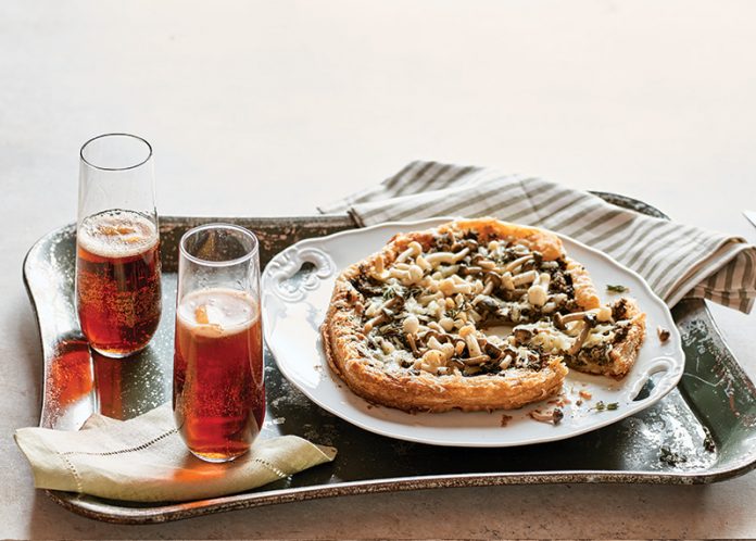 Mushroom Tart on tray with French Royal cocktail