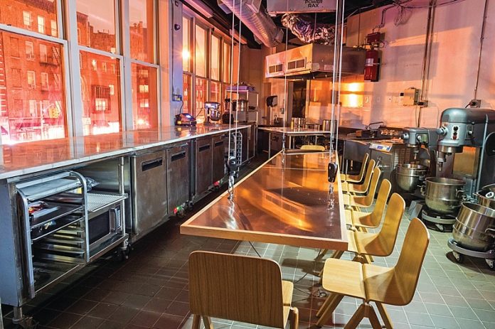 Dominique Ansel restaurant tables overlooking cityscape