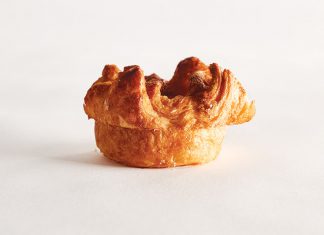Kouign Amann Kouign Amann single pastry on white