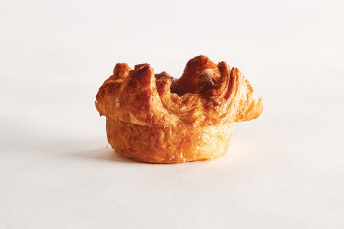 Kouign Amann single pastry on white