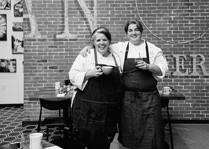 Willa Jean bakers photo is black and white in front of brick wall