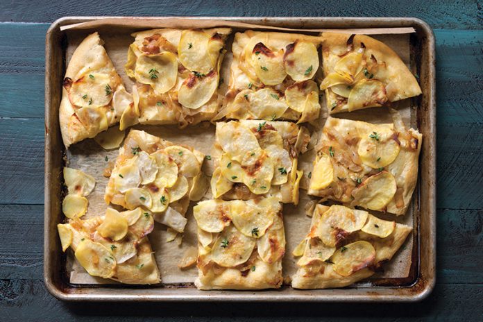 Focaccia with Potato on sheet pan sliced
