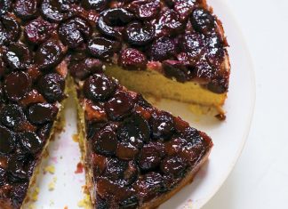Sweet Cherry and Cornmeal Upside-Down Cake Sweet Cherry Cornmeal Upside Cake sliced on white