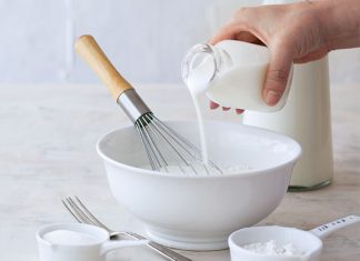 The Undisputed Champion of Tang: Buttermilk pouring buttermilk into a bowl.