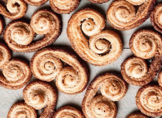 Palmiers with Vanilla Bean, Pecan, and Cardamom Palmiers with Vanilla Bean, Pecan, and Cardamom on parchment