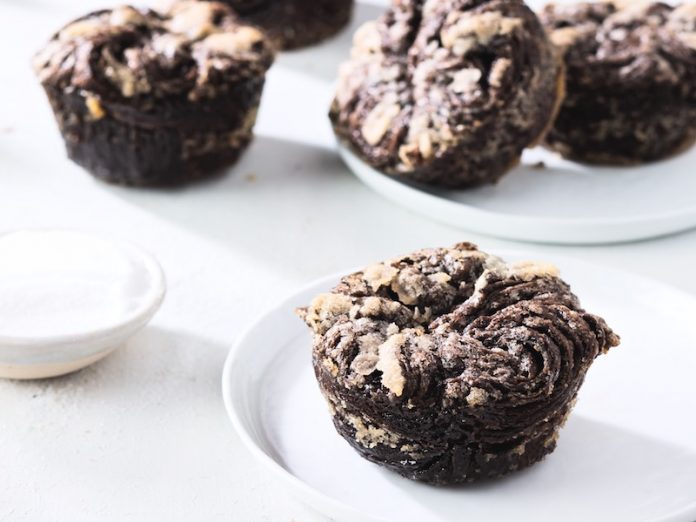Black Cocoa Kouign Amann on white plate