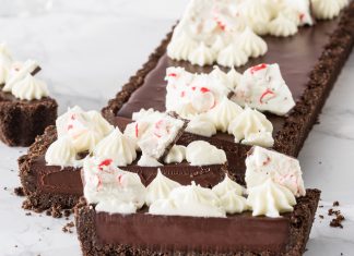 Triple-Chocolate Peppermint Tart triple-chocolate peppermint tart sliced on white marble