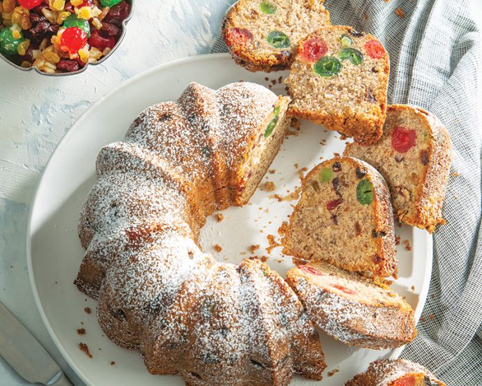 Fruitcake Bundt sliced on white plate