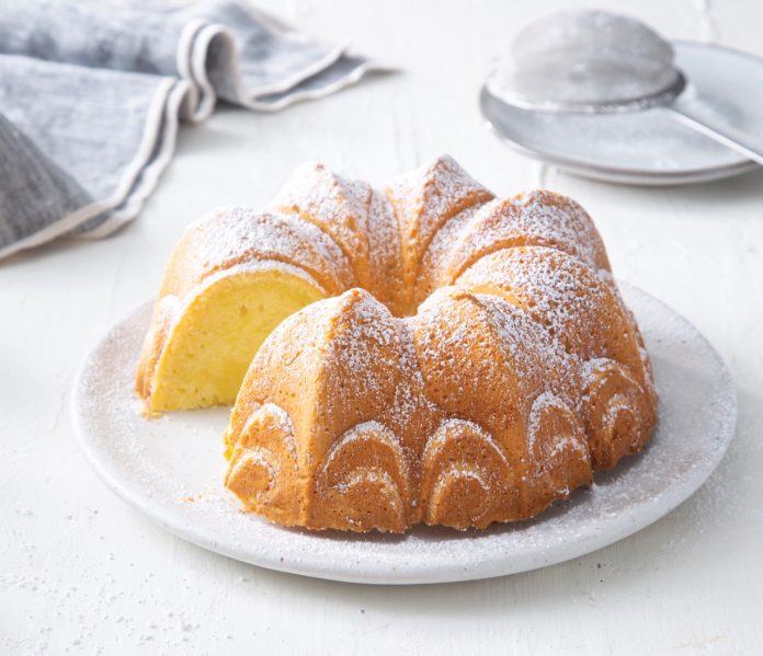 Basque bundt sliced on white plate
