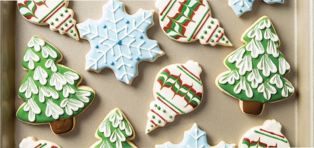 Christmas Sugar Cookies cut in shapes with royal icing