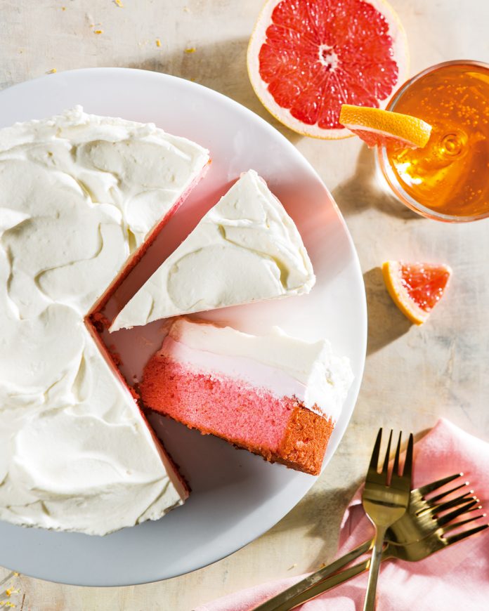 ZestOfLife_WD0127social Layered Grapefruit Cake sliced on white plate