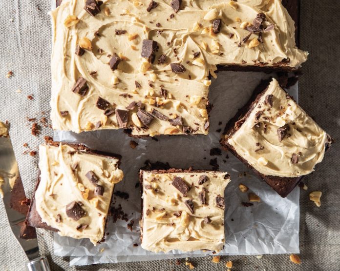 Peanut Butter-Chocolate Cakey Brownies on parchment baking recipe