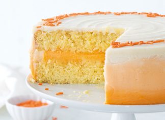 Orange Cream Cake Orange Cream Cake on white cake stand