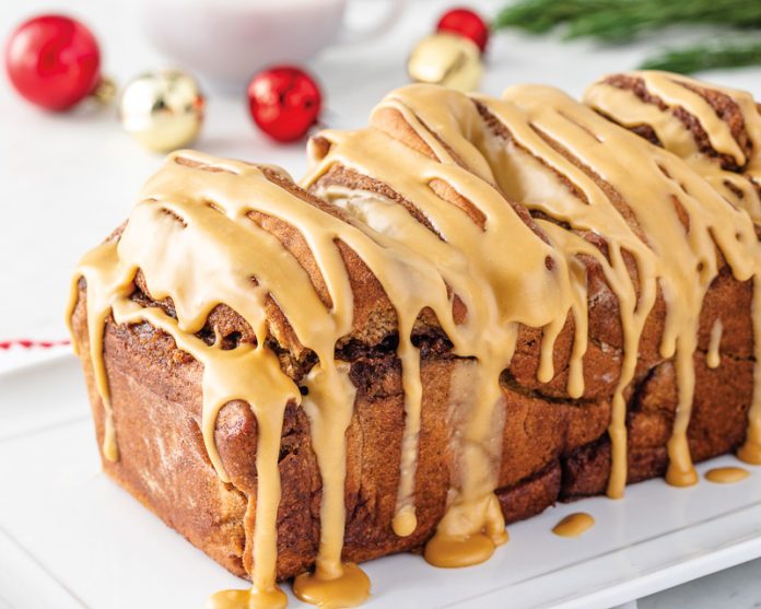 Gingerbread Spice Loaf glazed on a white plate