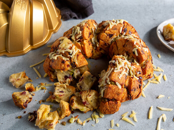 Take all the comforting flavors of traditional stuffing and combine them with the irresistible allure of freshly baked bread, and you have a side dish that is sure to be a new holiday tradition. This Pull-Apart Savory Stuffing Bundt, baked in the beautifully designed Nordic Ware 75th Anniversary Braided Bundt Pan, is a creative twist on a classic holiday favorite.