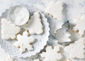 Mimosa Cutout Cookies mimosa cutout cookies on white surface with cookie cutters