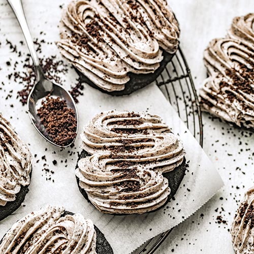 Oreo dessert with icing and cookie crumbles - Bake from Scratch Oreo dessert with icing and cookie crumbles