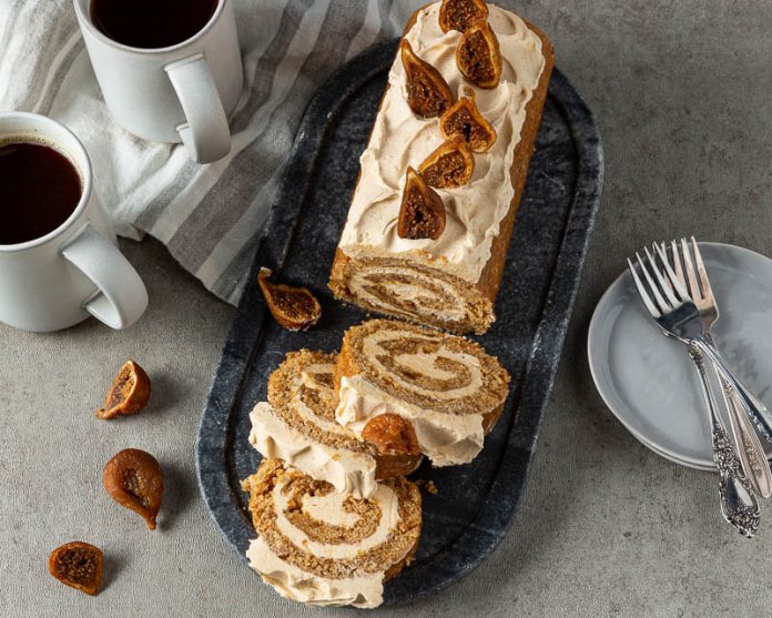 Figgy Pudding Roulade sliced on black plate