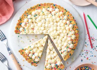 Birthday “Pie” birthday pie sliced with sprinkles and colored candles on white background birthday "pie" baking recipe