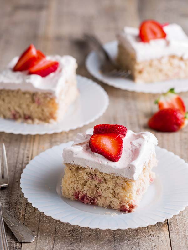 Strawberry Sheet Cakes on white plate with forks