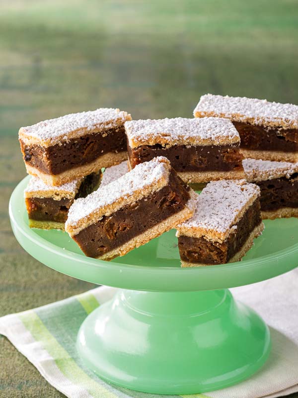 Gur Cake on Green Milk Glass Stand