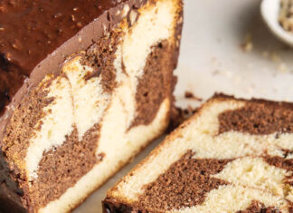 French Marble Pound Cake French Marble Pound Cake on white counter with bowl of hazelnuts