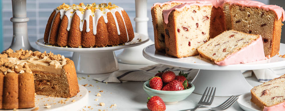 Six Perfect Pound Cakes Opener pound cakes on white cake stands